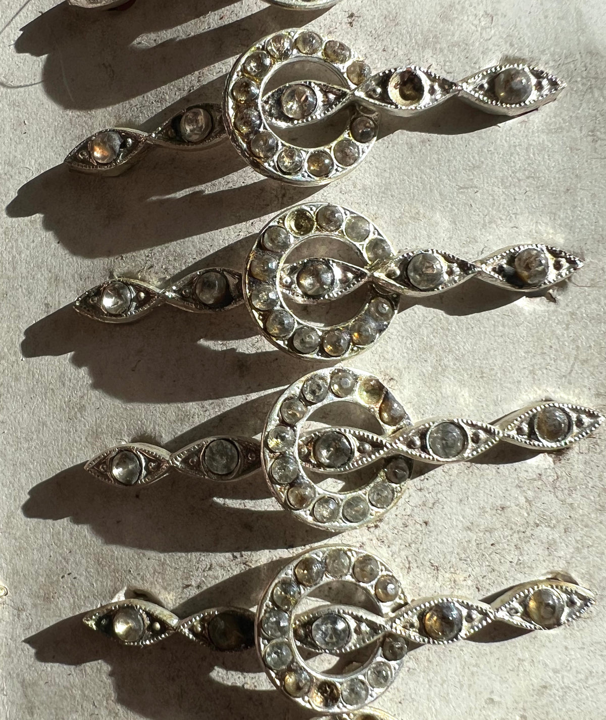 Sheet of 23 Lovely 1930s Hair Clips that Need Some Crystals Replacing