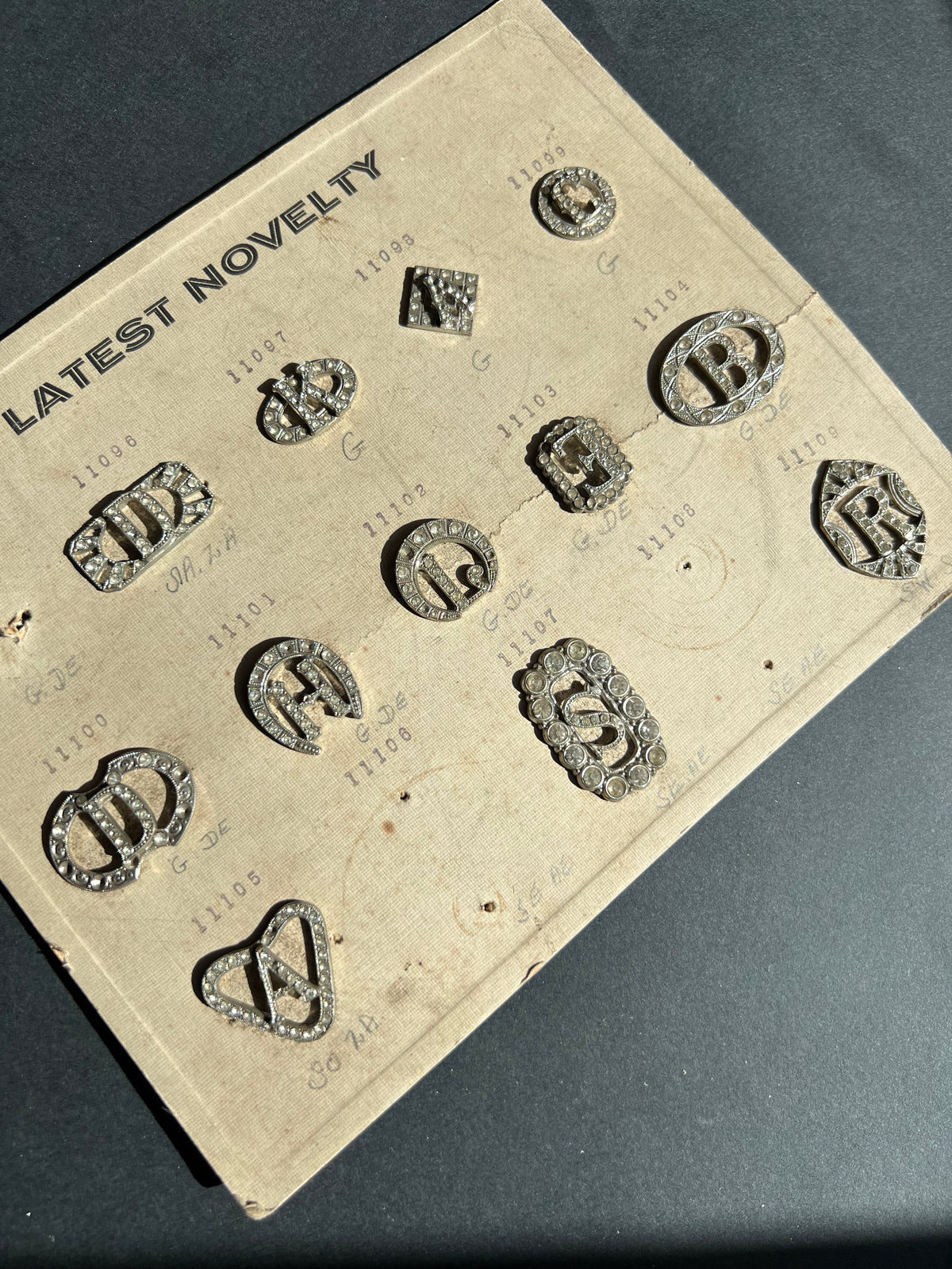 1930s Sheet of 12 Initial Clips that Need Some Crystals Replacing