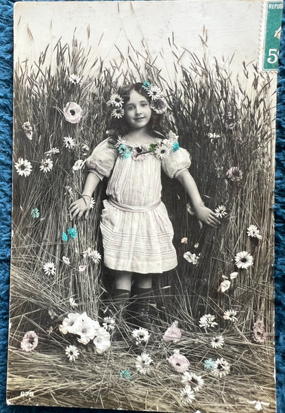 7 Pretty Early C20th French Postcards of Children with Flowers.