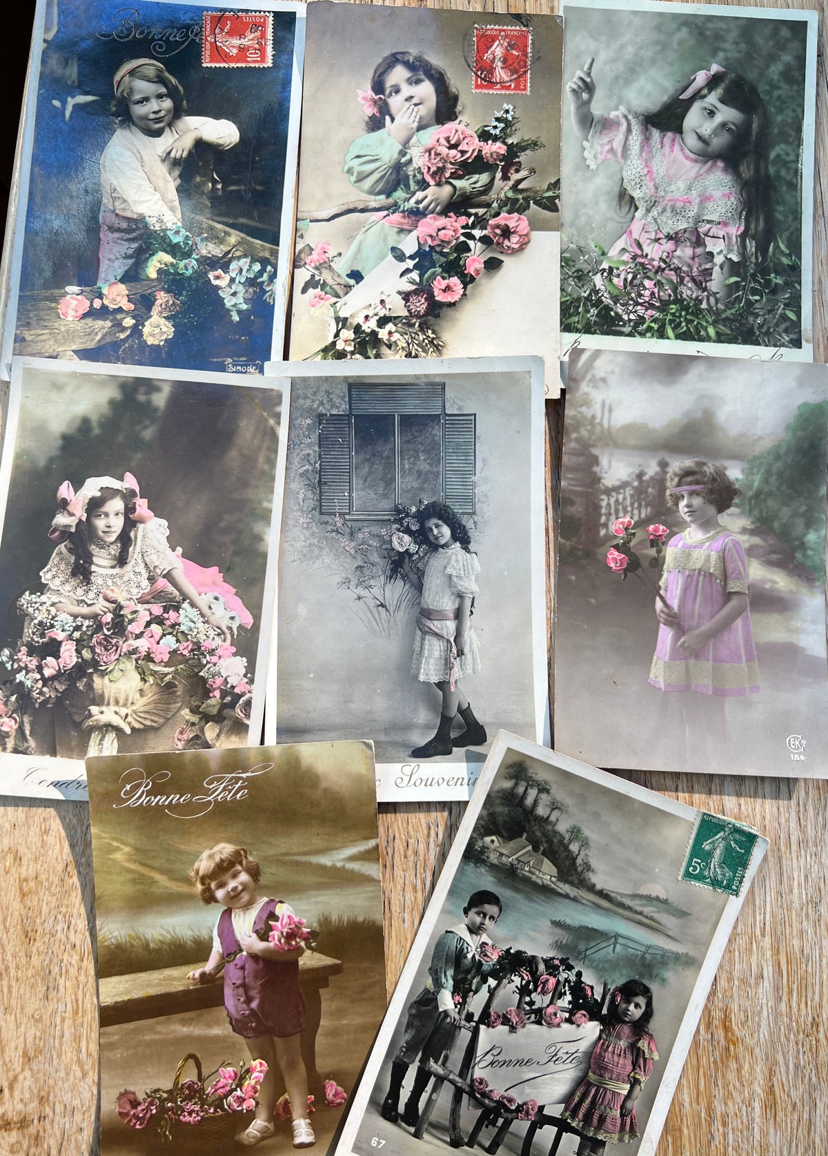 8 Pretty Early C20th French Postcards of Children with Flowers
