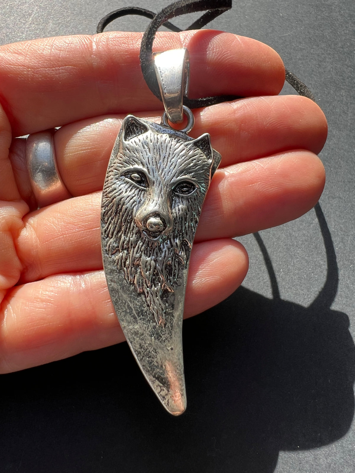 Striking Wolf Pendant on Faux Suede Cord.