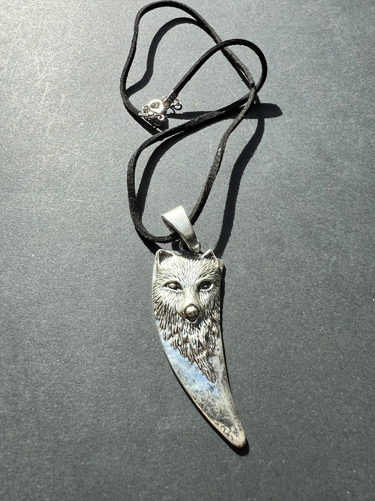 Striking Wolf Pendant on Faux Suede Cord.