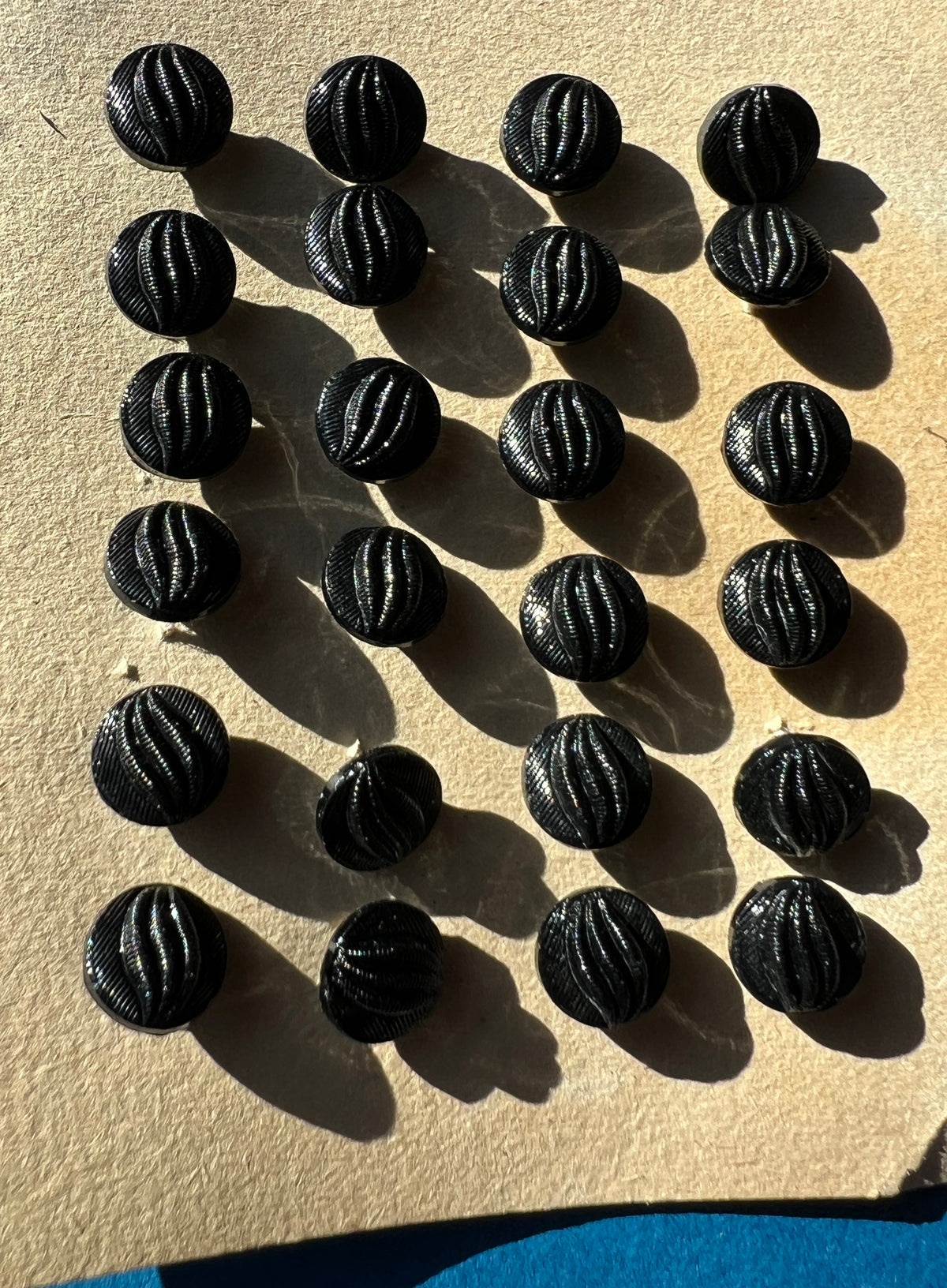 Sheet of 24 Early C20th Black Glass 1cm Buttons