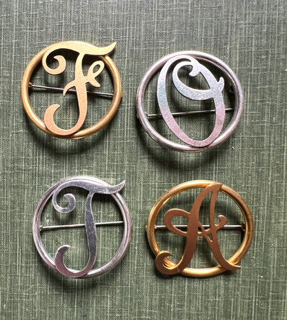 Big 1940s Initial Brooches A, F, O, T.