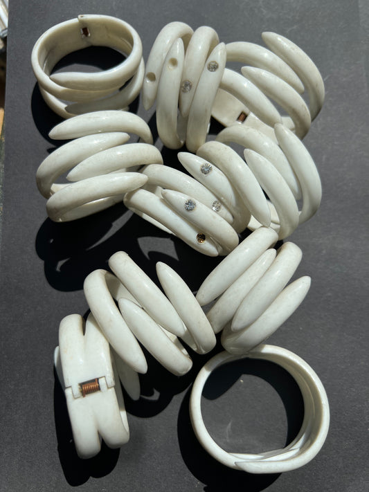10 Grubby 1960s Plastic Claw Bangles