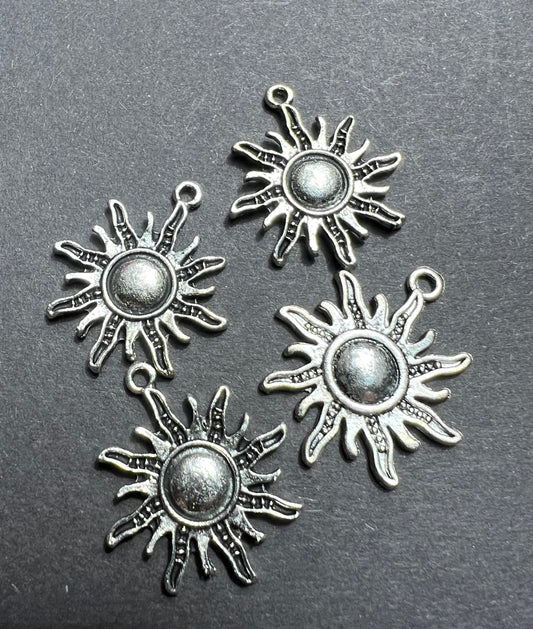 4 Sun or Star Charms - 2.5cm wide
