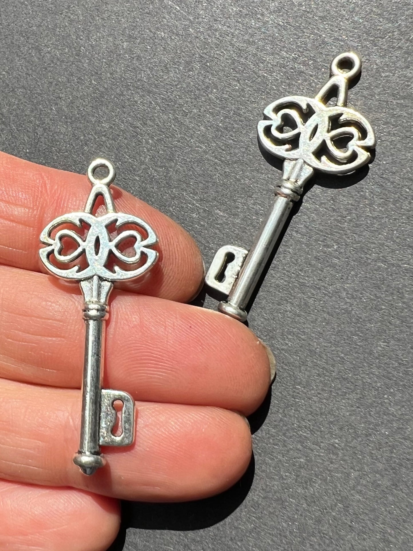 2 Mysterious Keys 4cm tall Silver Tone Charms