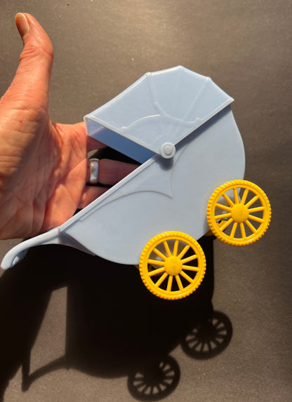 A RELIABLE Product Big 17cm Toy Pram with repaired wheel