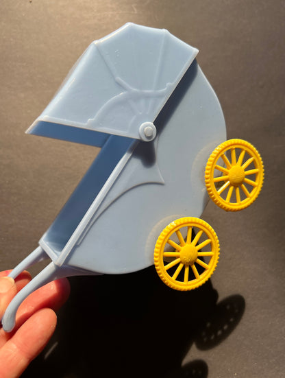A RELIABLE Product Big 17cm Toy Pram with repaired wheel