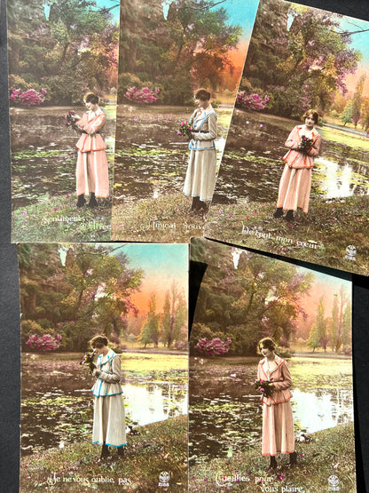 A Series of 5 French Hand Tinted Romantic Postcards dated 1922