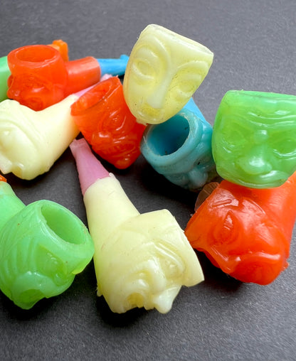 Vintage Grotesque Plastic Pipes with Faces ...Obviously...