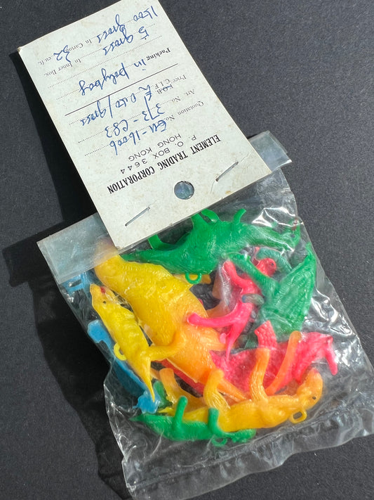 Vintage Salesman's Sample Bag of Neon Dinosaur Charms