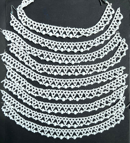 9 Pretty Vintage White Glass Necklaces with no clasps.