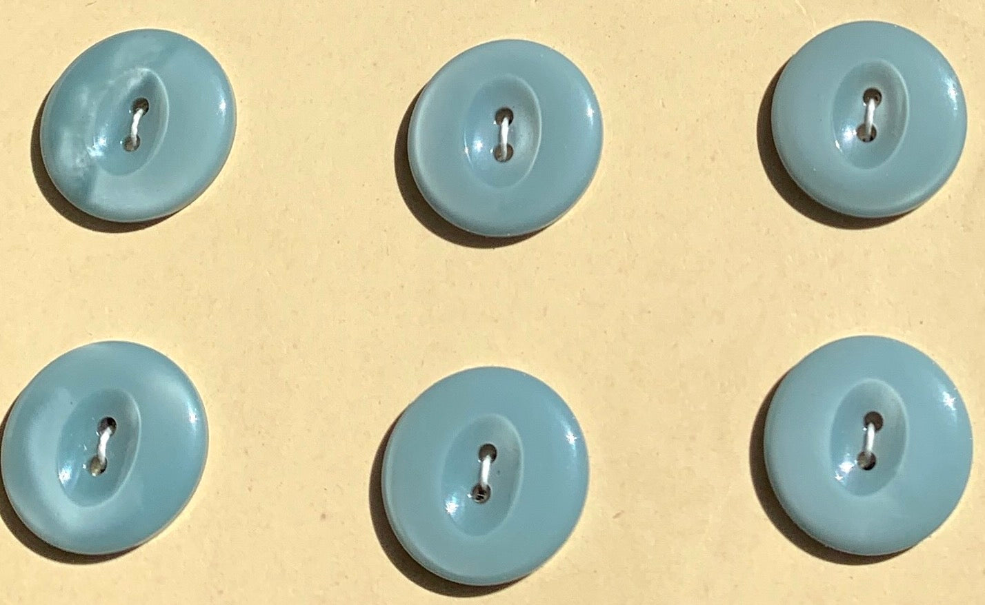 1.5cm Calm Blue Grey Vintage Buttons - 24 on a sheet  or 6 loose.