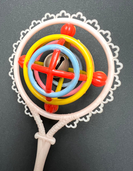Thought Provoking Vintage Rattle