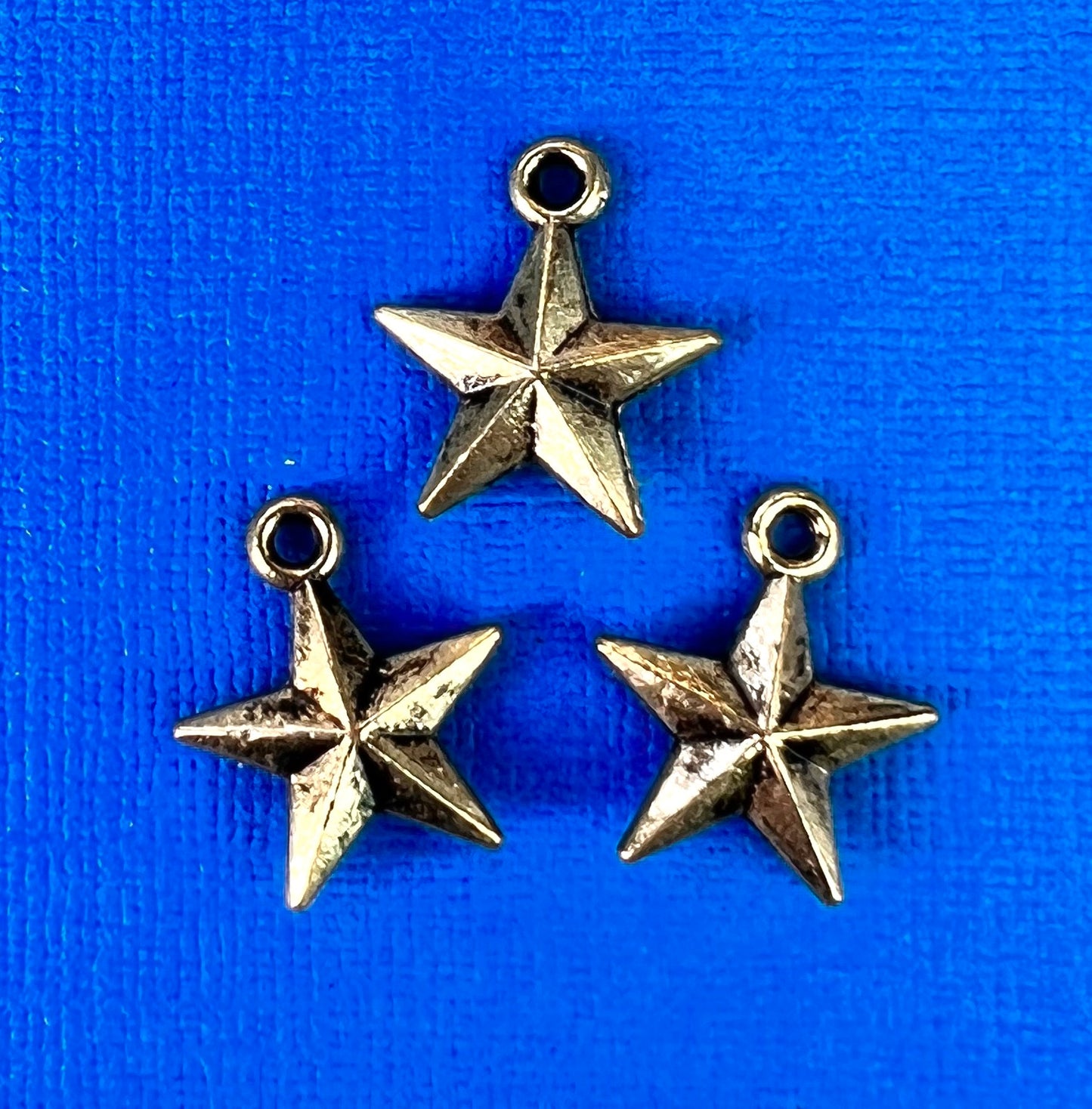 3 Little 1.5cm Bronze Tone Charms.