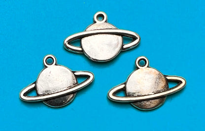 3 Perfect Little Planet Charms - 2.2cm wide.
