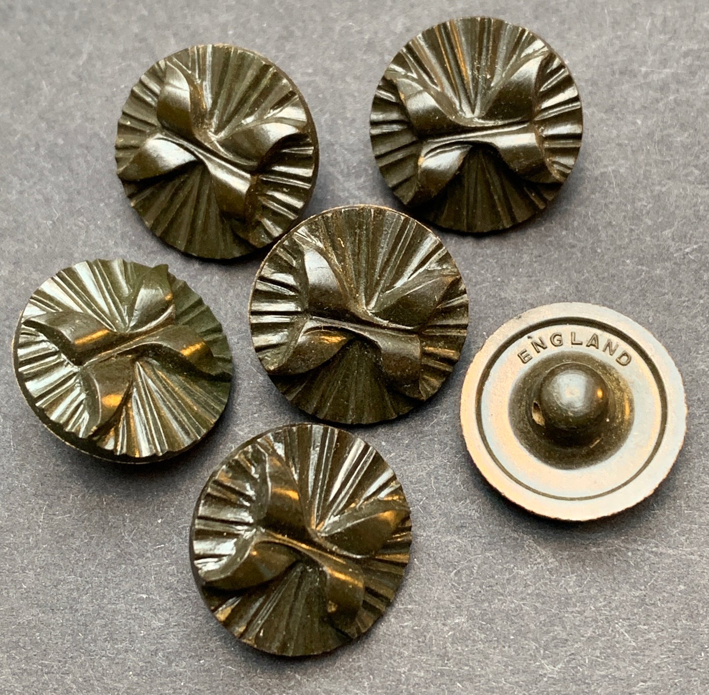 6 English Bakelite Browny Green 1.4cm Bow Buttons